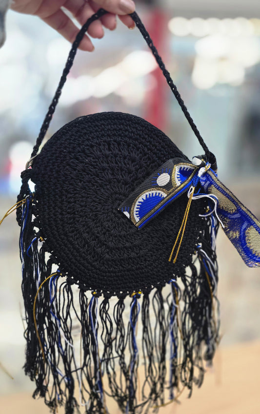 Cartera 100% a mano